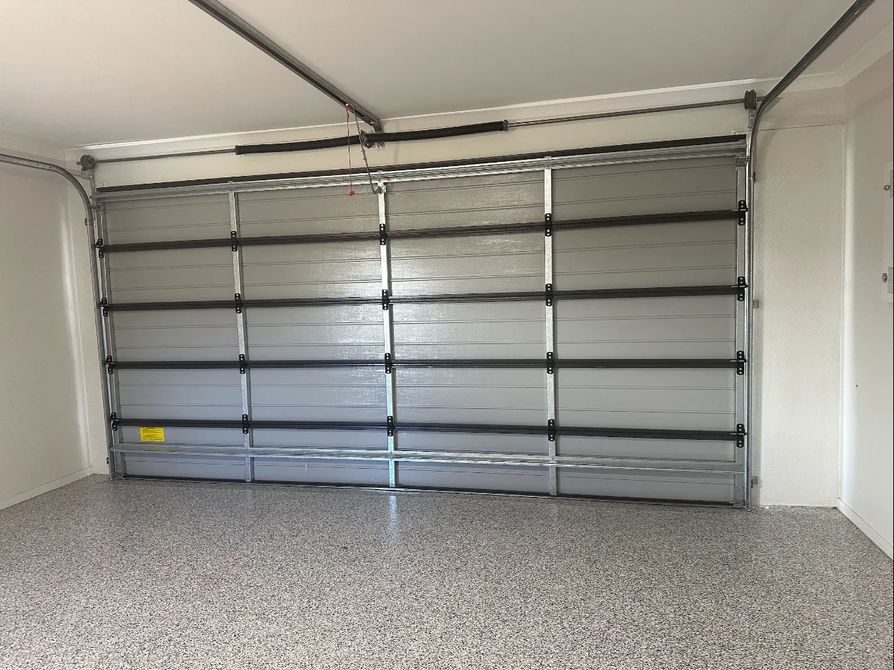 Garage with a grey flake epoxy floor