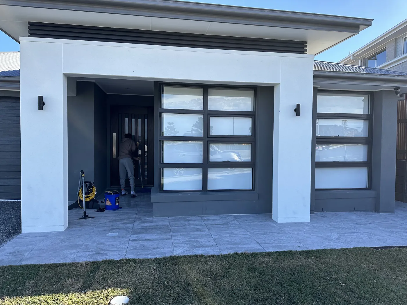 Cleaning at the front of a new house