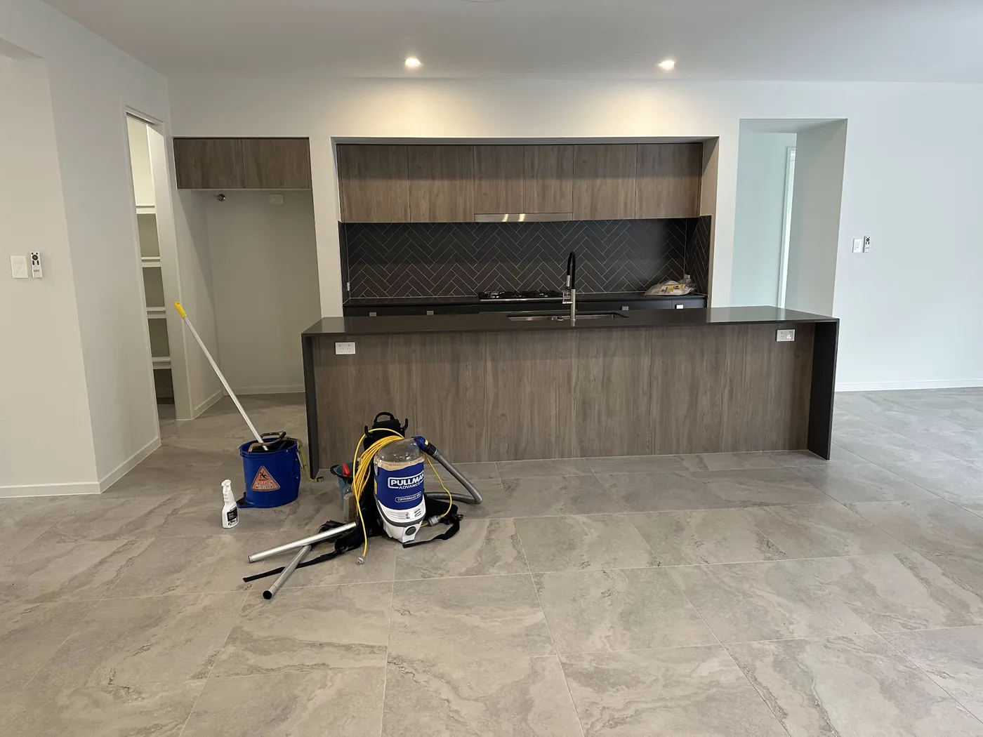 Cleaning equipment in a new, empty kitchen