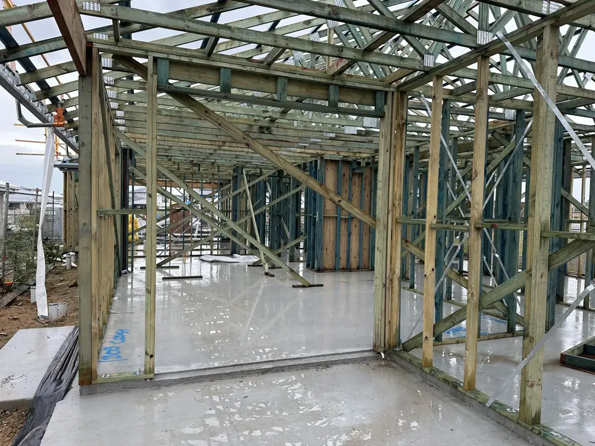 Timber wall frames and trusses on a slab