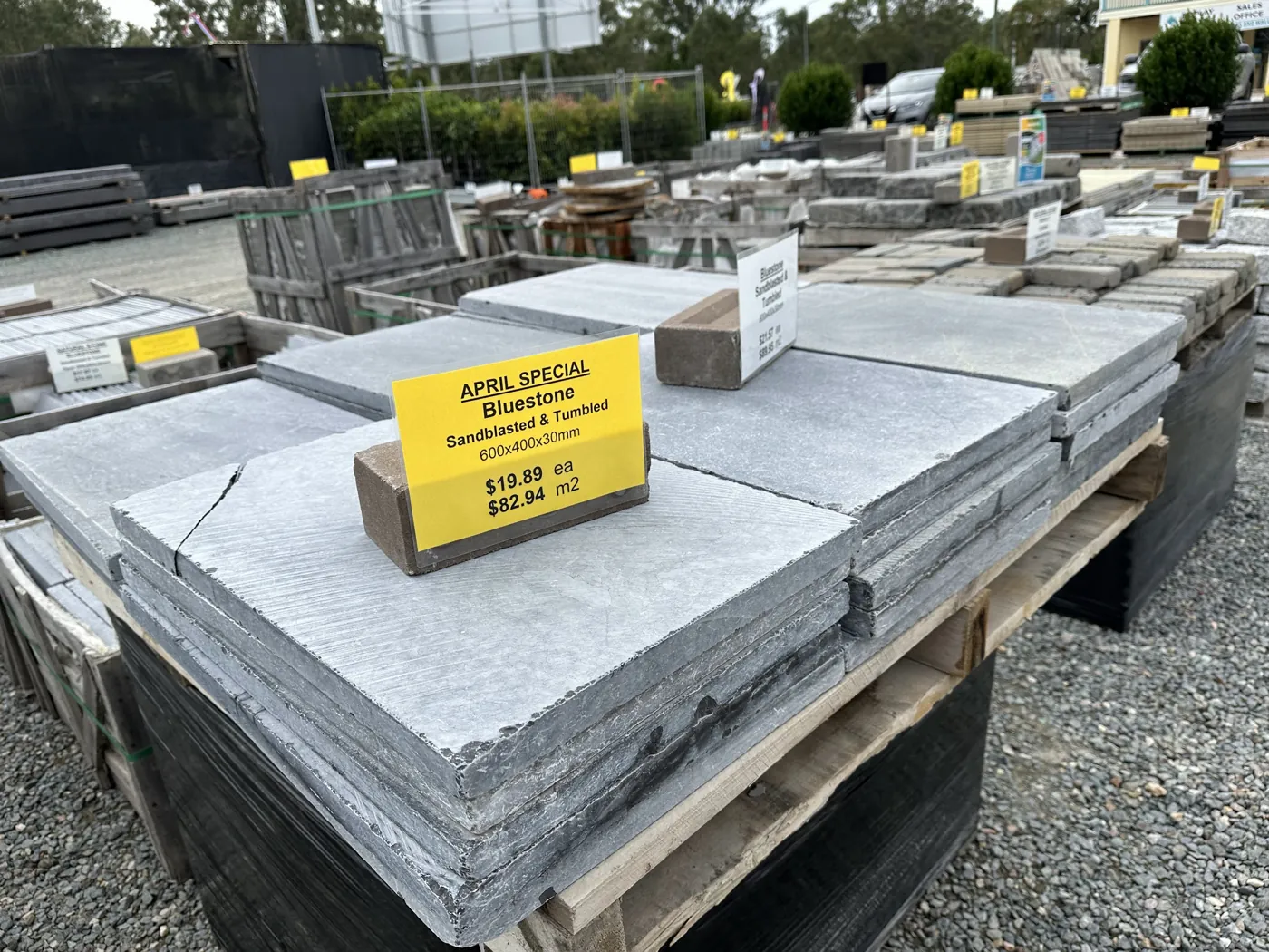 Bluestone pavers with a price sign